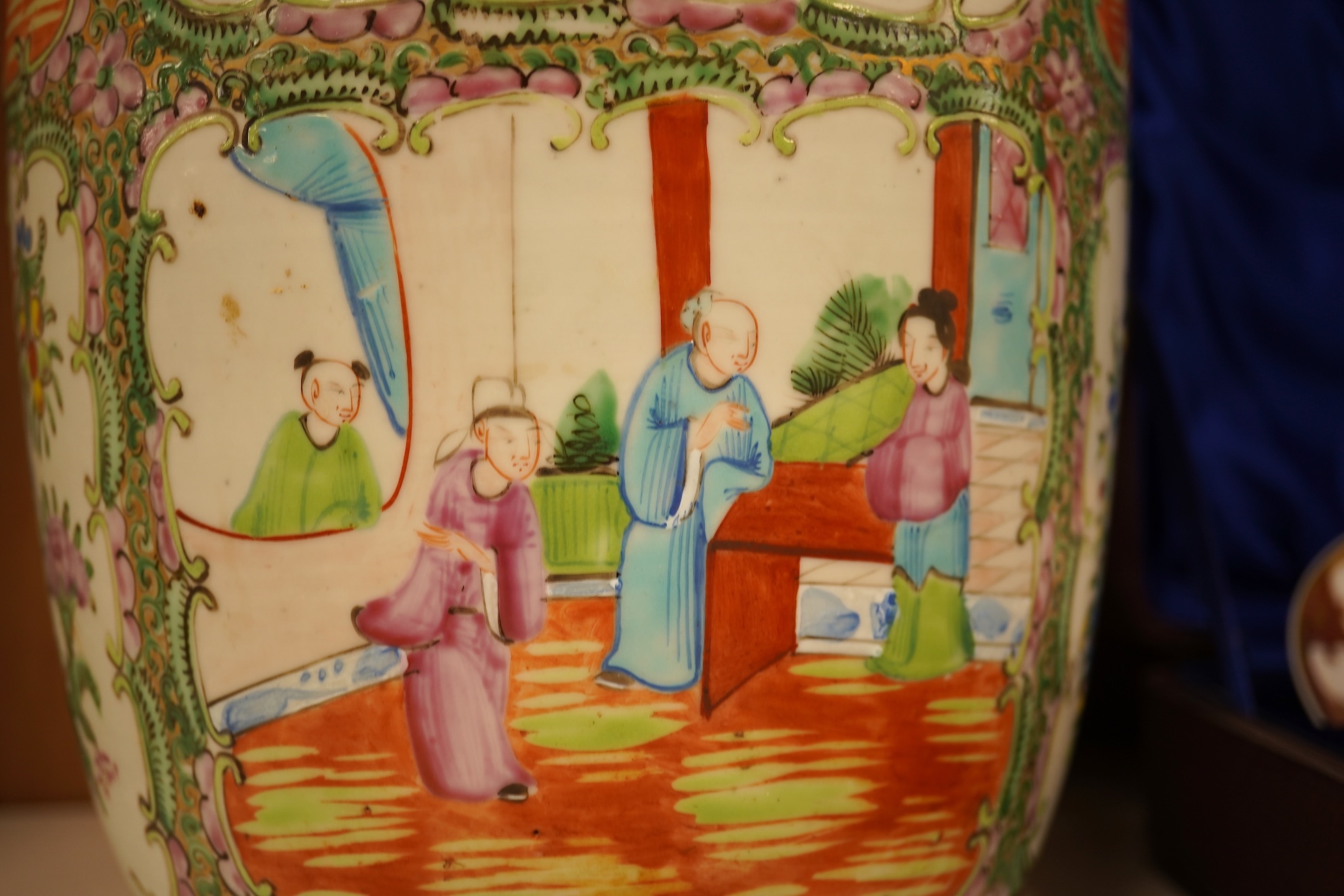 A 19th century Chinese famille rose baluster vase enamelled with flowers and figures, 44cm high
